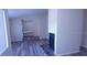 Living room with fireplace and light grey wood floors at 261 Dublin Dr, Lake Mary, FL 32746