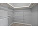 Interior of closet with metal shelving and rod at 5783 Peregrine Ave # C07, Orlando, FL 32819