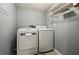 Bright laundry room featuring a newer model washer and dryer at 5783 Peregrine Ave # C07, Orlando, FL 32819