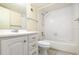 Clean bathroom featuring a tub, shower, vanity, and a toilet at 120 Hibiscus Woods Ct # 8D, Deltona, FL 32725