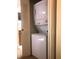 Convenient in-unit laundry with stacked washer and dryer at 120 Hibiscus Woods Ct # 8D, Deltona, FL 32725