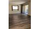Bright living room with sliding glass doors leading to a private balcony at 120 Hibiscus Woods Ct # 8D, Deltona, FL 32725