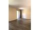 Living room showing light-filled space with a sliding glass door at 120 Hibiscus Woods Ct # 8D, Deltona, FL 32725