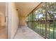 Covered, screened lanai offering outdoor living space at 120 Hibiscus Woods Ct # 8D, Deltona, FL 32725