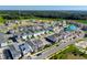 Aerial view of a new neighborhood with various houses at 344 Belmond Dr, Debary, FL 32713