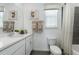 Clean bathroom with white vanity, shower, and modern fixtures at 344 Belmond Dr, Debary, FL 32713