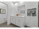 Double vanity bathroom with modern fixtures and gray tile at 344 Belmond Dr, Debary, FL 32713