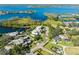 Bird's eye view of lakefront properties featuring beautiful landscapes and serene water views at 8984 Houston Pl # 103, Orlando, FL 32819