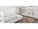 Inviting bedroom with sliding glass doors and abundant natural light at 8984 Houston Pl # 103, Orlando, FL 32819