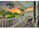 Relaxing front porch with seating area, overlooking a tranquil neighborhood at 2584 Dividing Creek Path, The Villages, FL 32162