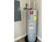 Modern water heater with clearly visible energy guide information at 709 N Lincoln Ave, Lakeland, FL 33815