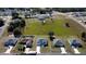 Overhead view showing the home's location, yard size, and proximity to nearby amenities in a residential neighborhood at 6208 Sw 129Th St, Ocala, FL 34473