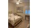 Bedroom with a queen-size bed and a window seat at 2800 Tropic Ct, Winter Garden, FL 34787