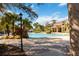 Community pool with lounge chairs at 4436 Cleary Way, Orlando, FL 32828