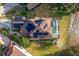 House with solar panels, pool, and fenced backyard at 496 Mile Post Ct, Lake Mary, FL 32746