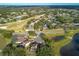 Aerial view of a luxury home community near a golf course at 496 Mile Post Ct, Lake Mary, FL 32746