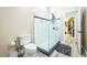 Bathroom with toilet, shower, and modern vanity at 496 Mile Post Ct, Lake Mary, FL 32746