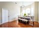 Bright dining room with hardwood floors and a farmhouse table at 496 Mile Post Ct, Lake Mary, FL 32746