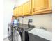 Laundry room with washer, dryer, and utility sink at 496 Mile Post Ct, Lake Mary, FL 32746