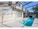 View of the pool from the home's exterior at 496 Mile Post Ct, Lake Mary, FL 32746