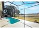 Relaxing screened pool with open backyard view at 496 Mile Post Ct, Lake Mary, FL 32746