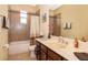 Clean bathroom with tub, shower, and vanity at 10063 Malmsbury Rd, Orlando, FL 32829