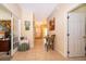 Bright hallway with tile floors and artwork at 10063 Malmsbury Rd, Orlando, FL 32829