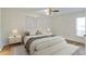 Spacious bedroom with hardwood floors and neutral decor at 543 Warrenton Rd # 543, Winter Park, FL 32792