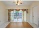 Dining room with sliding glass doors leading to a patio at 543 Warrenton Rd # 543, Winter Park, FL 32792