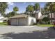 Charming home featuring an attached two-car garage and surrounded by mature trees and landscaping at 543 Warrenton Rd # 543, Winter Park, FL 32792