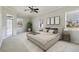 Spacious main bedroom with a king-size bed and sliding door access to the outside at 9868 Montclair Cir, Apopka, FL 32703