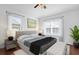 Cozy bedroom with ample natural light, modern decor, and a neutral color palette at 3010 San Jacinto Cir # 3010, Sanford, FL 32771