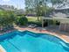 Large community pool with sun loungers and a covered pavilion at 3010 San Jacinto Cir # 3010, Sanford, FL 32771