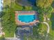 Aerial view of rectangular community pool with brick patio and lounge chairs at 3010 San Jacinto Cir # 3010, Sanford, FL 32771