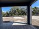 Large backyard with paver patio and view of trees at 1173 Basalt Ln, Sanford, FL 32771
