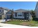 Beautiful single-story home featuring stone accents and a lush landscaped front yard at 1173 Basalt Ln, Sanford, FL 32771