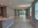 Open concept living space, featuring windows and sliding glass doors with plenty of natural light at 1173 Basalt Ln, Sanford, FL 32771