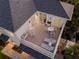 Rooftop balcony with lounge chairs, table and chairs, and fire pit at 4260 S Atlantic Ave, Port Orange, FL 32127