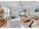 Gathering room with sliding glass doors leading to the pool area at 4260 S Atlantic Ave, Port Orange, FL 32127