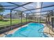 Inviting enclosed pool area for swimming and fun, perfect for relaxation or entertaining at 2204 Clementine Trl, Clermont, FL 34714