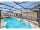 Enjoy this private enclosed pool area with plenty of sunshine and room to swim at 2204 Clementine Trl, Clermont, FL 34714