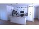 Kitchen featuring pendant lighting and a black sink at 13882 Sw 56Th Ln, Ocala, FL 34482