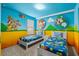 Themed bedroom with twin beds and Super Mario decor at 1473 Moon Valley Dr, Davenport, FL 33896
