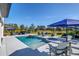 Aerial view of a home with pool, spa, outdoor kitchen, patio, and well-maintained lawn at 4001 Ainsley Ave, Orlando, FL 32833
