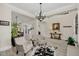 Spacious foyer with tiled floors, comfortable chairs, and a view into the open-concept living spaces at 4001 Ainsley Ave, Orlando, FL 32833