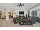 Cozy living room with entertainment center, comfortable seating, and stylish decor at 4001 Ainsley Ave, Orlando, FL 32833
