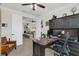 Comfortable office with a desk, chair, and view into the adjacent Gathering room at 4001 Ainsley Ave, Orlando, FL 32833