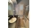 Bathroom with shower/tub combo, vanity, and window shutters at 1833 Queen Palm Dr, Apopka, FL 32712