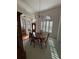 Spacious dining room with wood flooring and windows at 1833 Queen Palm Dr, Apopka, FL 32712