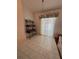Dining room with wood table and access to backyard at 1833 Queen Palm Dr, Apopka, FL 32712
